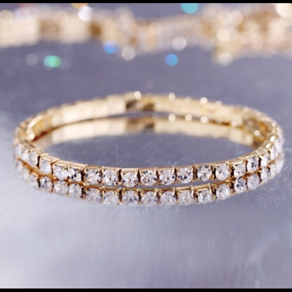 Stretchy rhinestone gold bracelet.